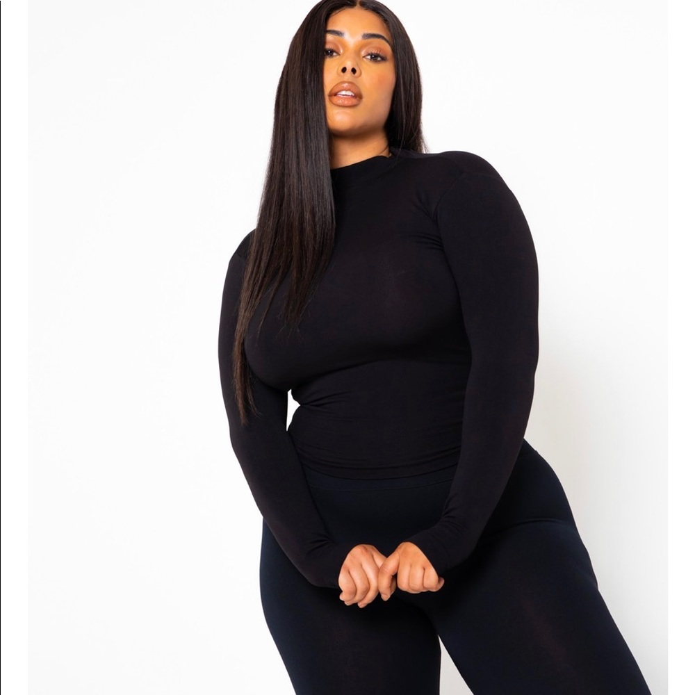 Turtle neck. Never worn.